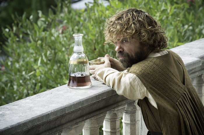 Tyrion Lannister from Game of Thrones with wine