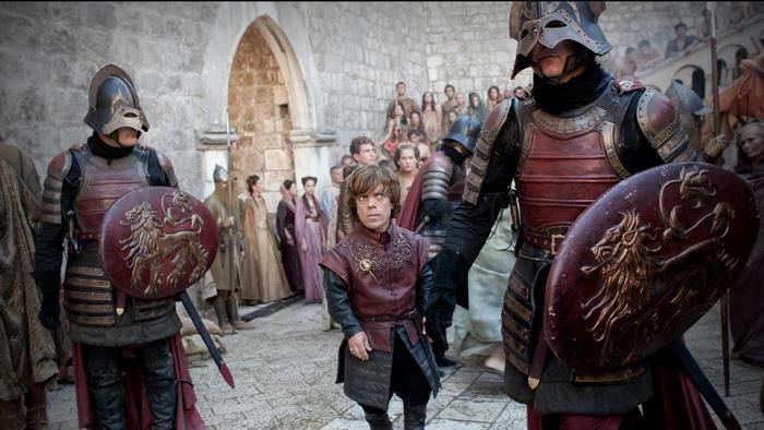 Tyrion Lannister from Game of Thrones with guards