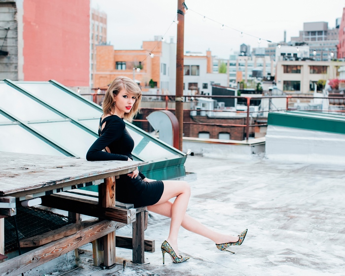 Taylor Swift on a rooftop