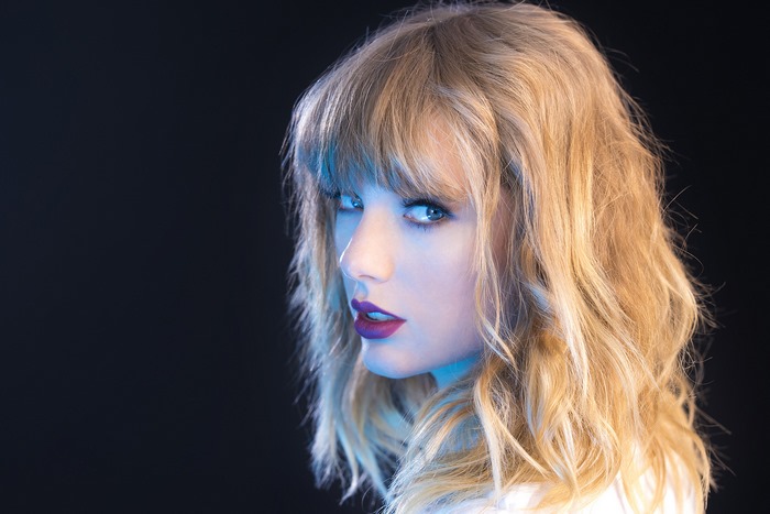 Taylor Swift Portrait with Blonde Hair and Blue Lighting