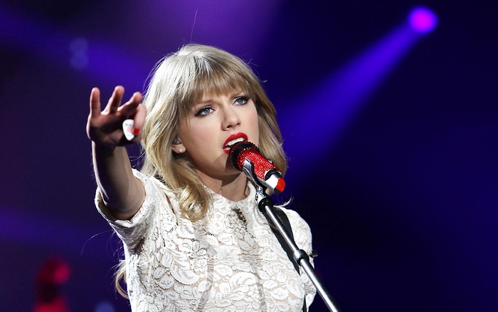 Taylor Swift performing on stage