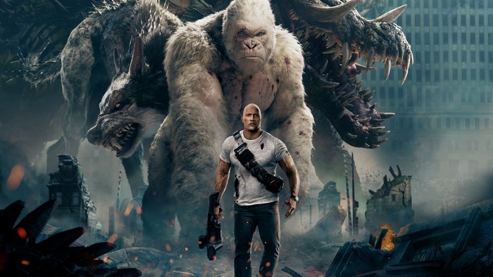 Dwayne Johnson with monsters from Rampage