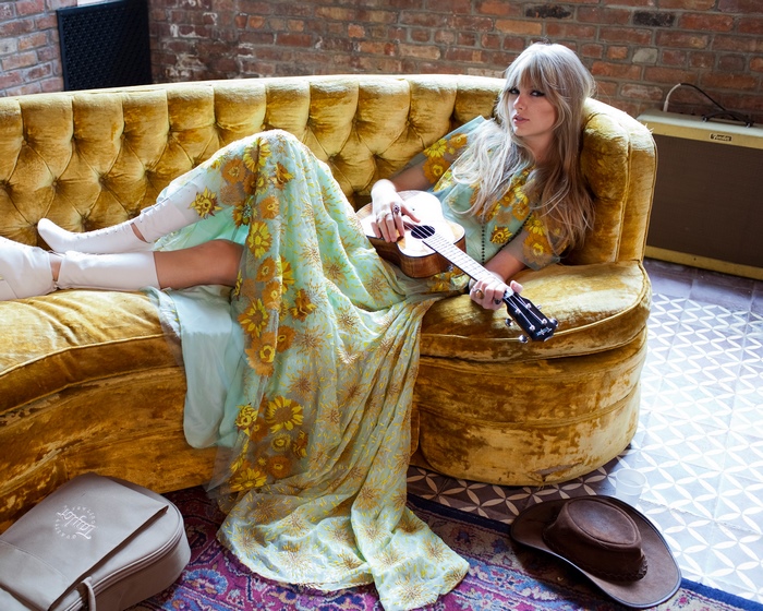 Taylor Swift with Ukulele on Velvet Couch