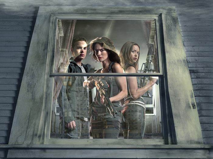 Lena Headey and two others with guns