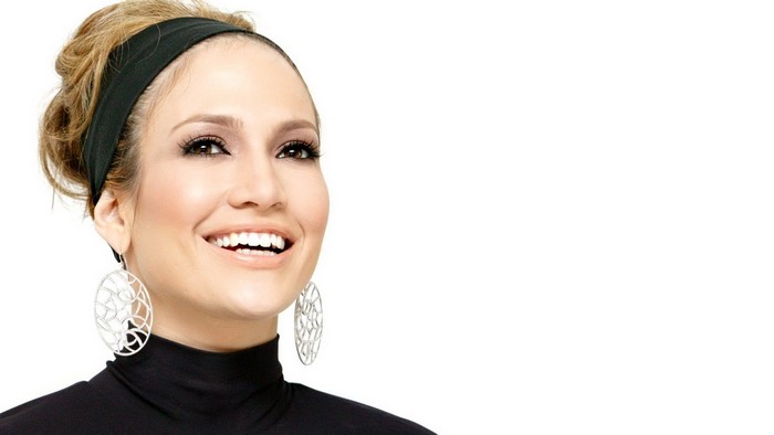 Jennifer Lopez with black headband and earrings