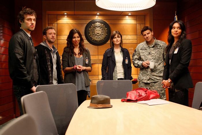 Bones cast in a meeting room