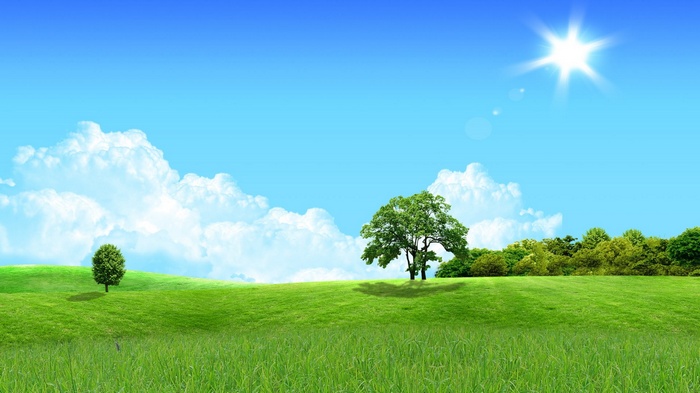 Green rolling hills under a bright blue sky with sun and clouds