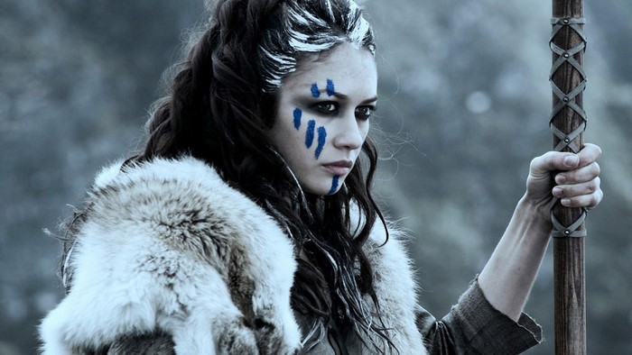 Olga Kurylenko as a warrior with face paint