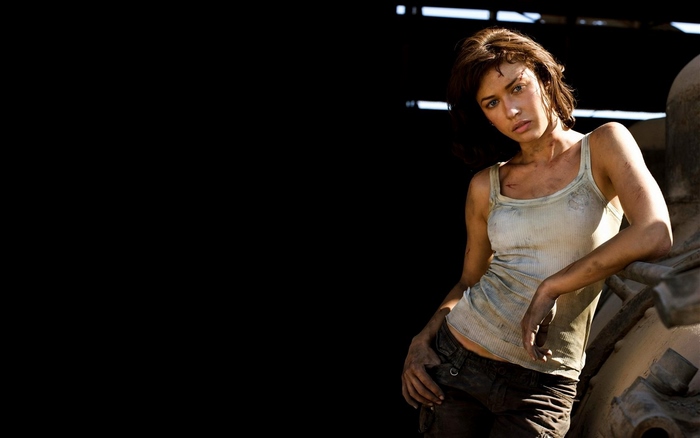 Olga Kurylenko in a dirty tank top and pants