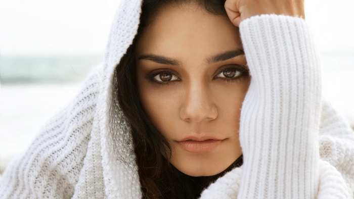 Vanessa Hudgens wearing a white sweater