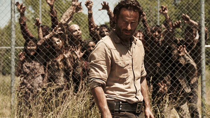 Rick Grimes from The Walking Dead surrounded by zombies