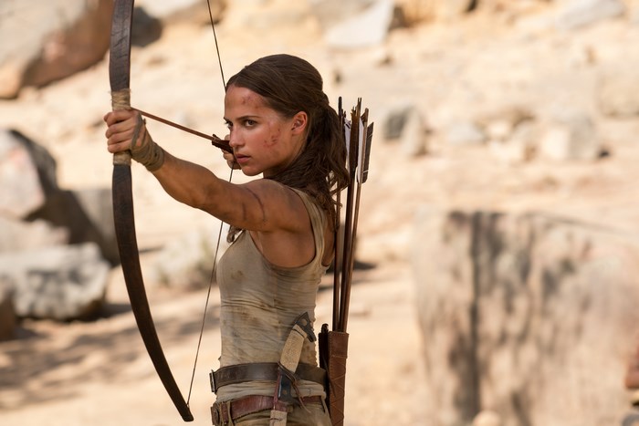 Alicia Vikander as Lara Croft with bow and arrow