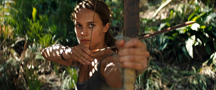 Alicia Vikander as Lara Croft with a bow