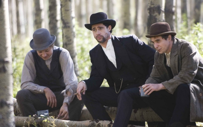 Brad Pitt and two men in hats