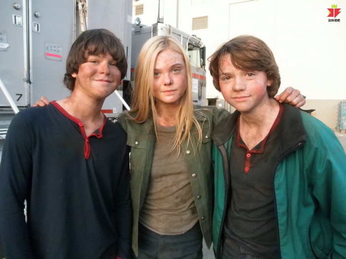 Elle Fanning with two boys