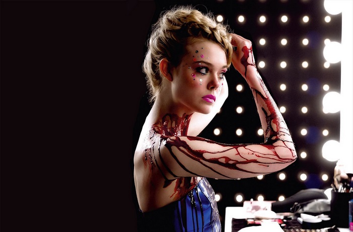 Elle Fanning with blood-like paint