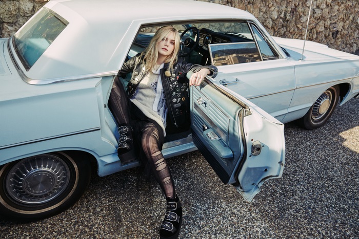 Elle Fanning in a vintage car