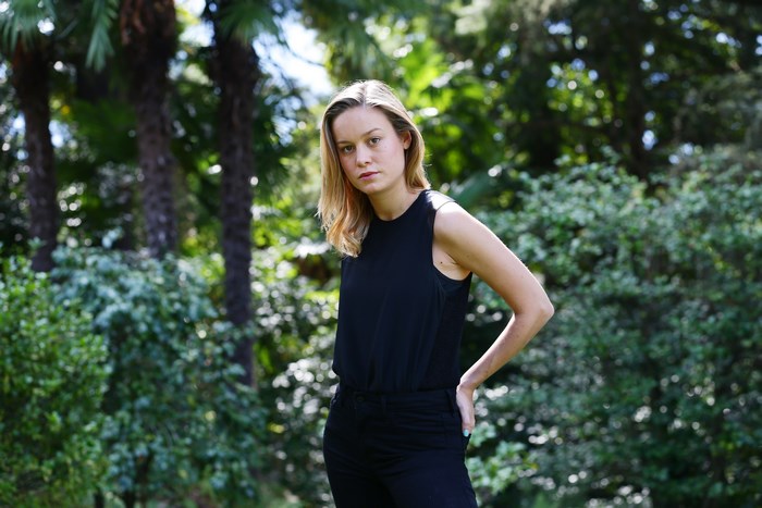 Brie Larson Outdoors Amid Greenery in Black Top