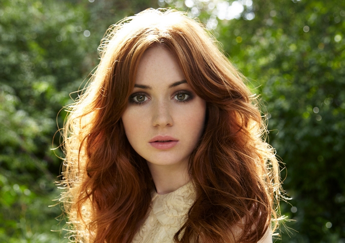 Portrait of Karen Gillan with Long Red Hair Outdoors