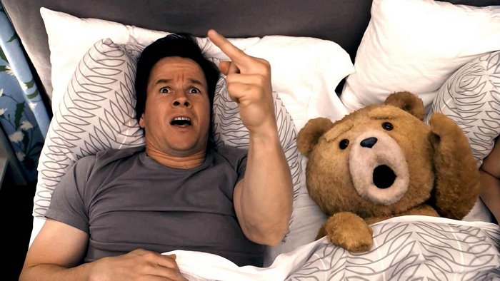 Mark Wahlberg and Ted in bed