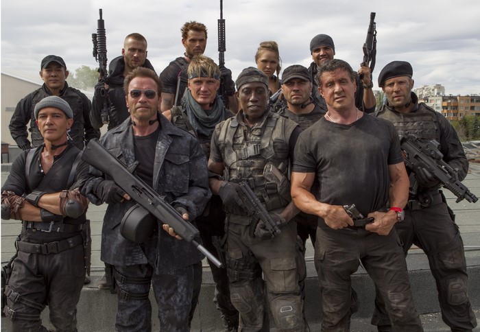 The Expendables 3 cast posing with weapons