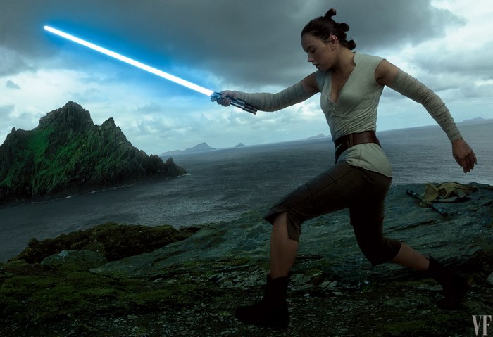 Rey from Star Wars with a lightsaber on a rocky island