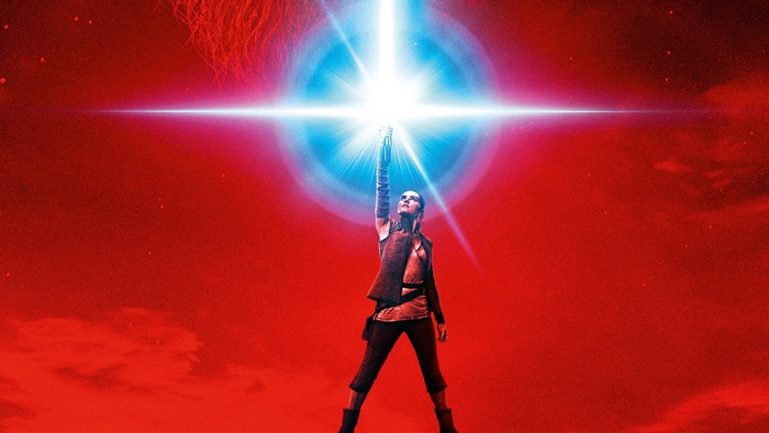 Rey from Star Wars holding a lightsaber