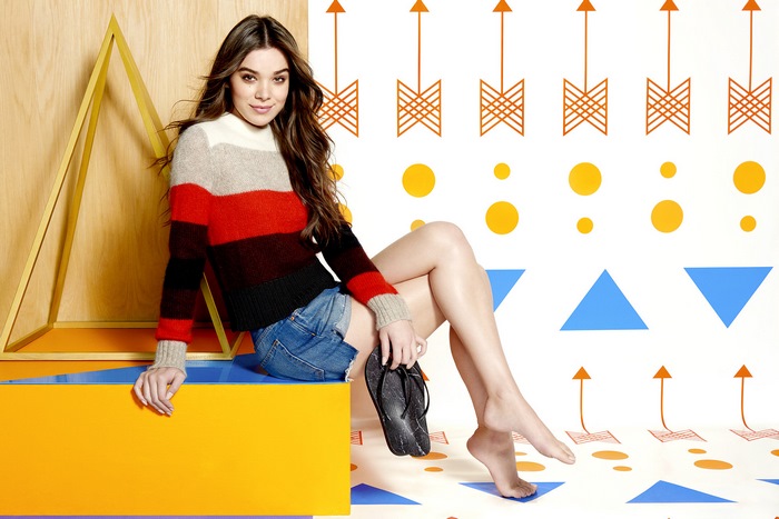 Hailee Steinfeld in striped sweater and denim shorts