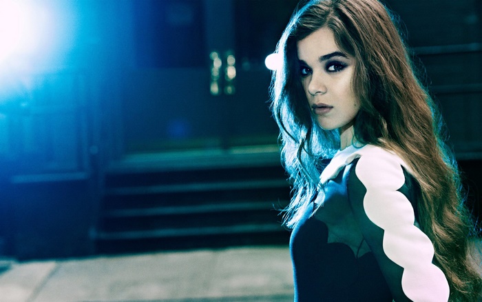 Hailee Steinfeld with Intense Gaze in Dark Setting