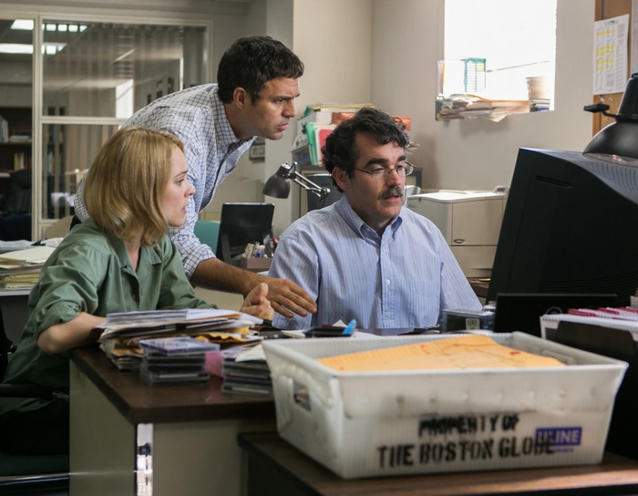 Rachel McAdams and two men in an office