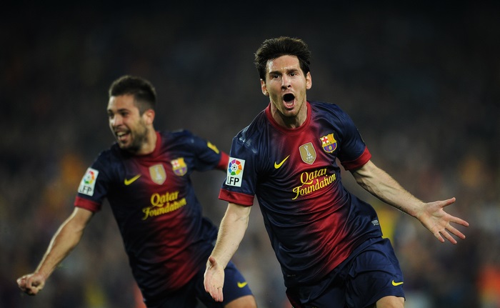 Lionel Messi and Jordi Alba celebrating a goal
