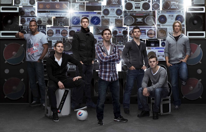 Lionel Messi and other men with boomboxes