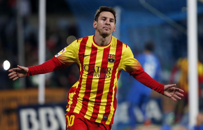 Lionel Messi playing soccer for Barcelona