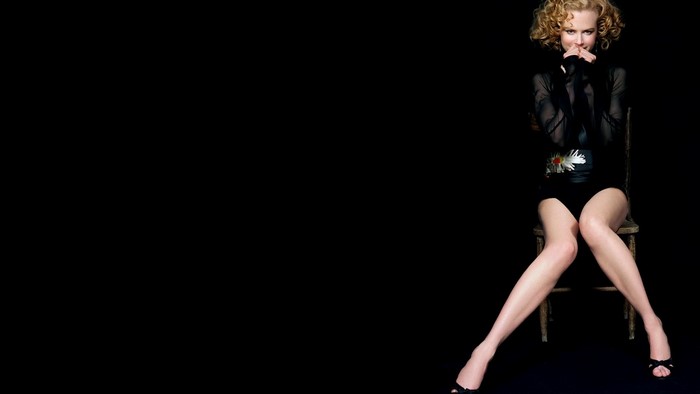 Nicole Kidman sitting on a chair