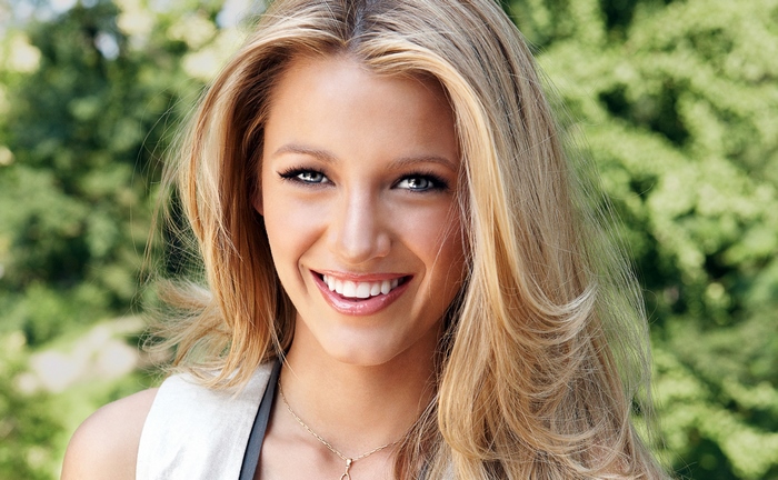 Blake Lively smiling outdoors