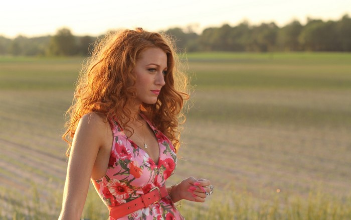 Blake Lively in a floral dress in a field