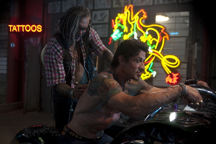 Sylvester Stallone getting a tattoo