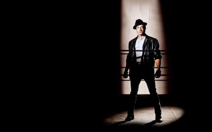 Sylvester Stallone as Rocky Balboa in a boxing ring