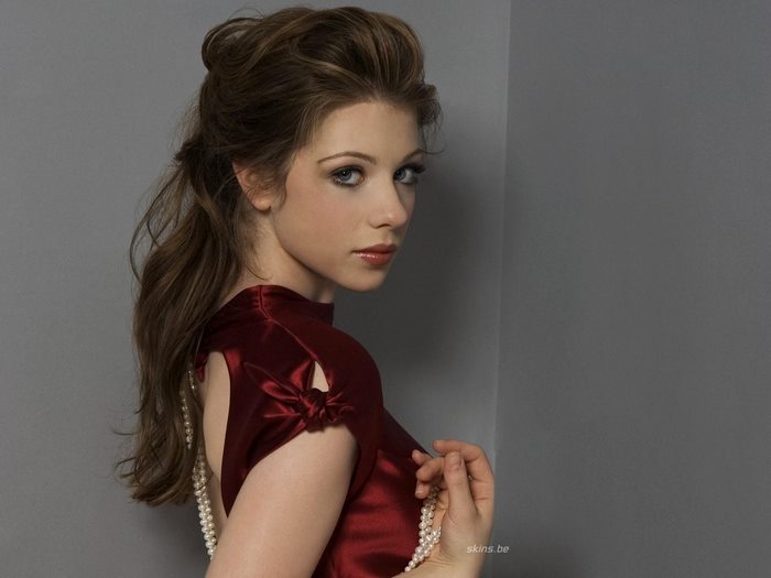 Michelle Trachtenberg in Elegant Satin Dress Holding Pearls