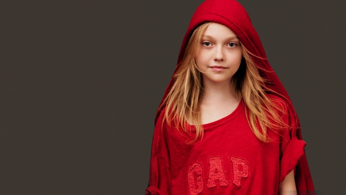 Dakota Fanning wearing a red Gap hoodie