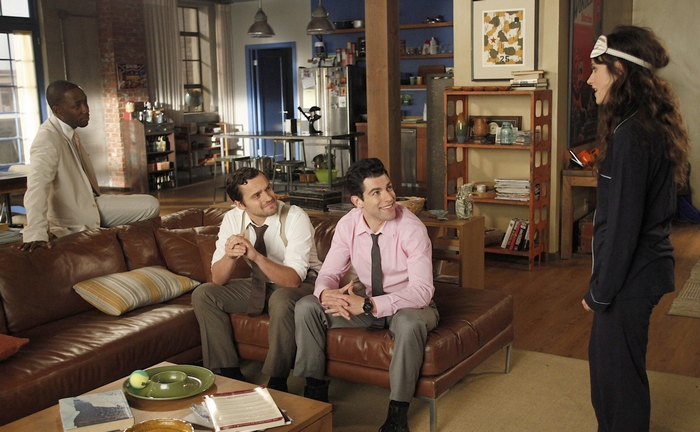 Jake Johnson and friends in a living room