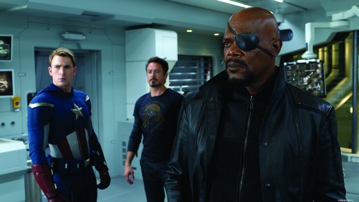Captain America, Iron Man, and Nick Fury in a room