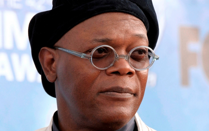 Samuel L. Jackson wearing glasses and a hat