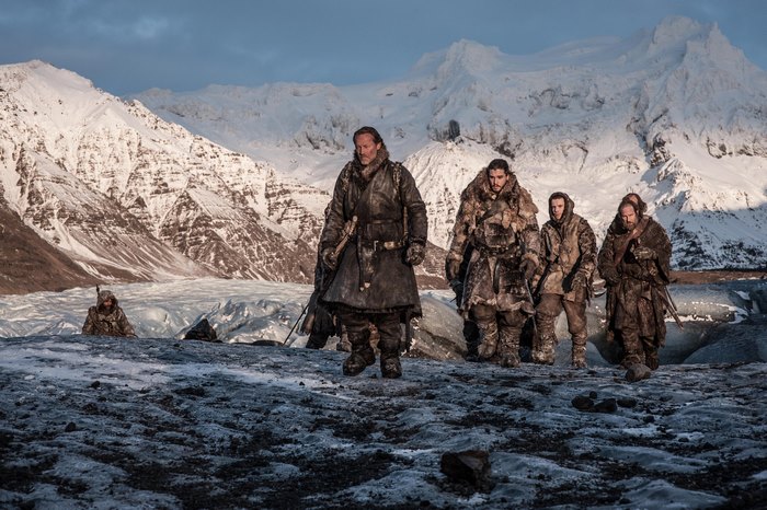 Iain Glen and companions on a snowy mountain