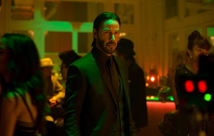 Keanu Reeves in a dark suit