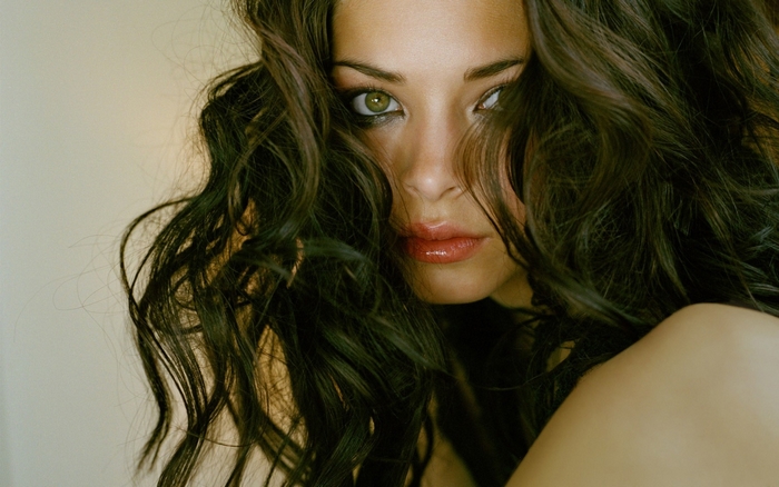 Kristin Kreuk portrait with dark curly hair
