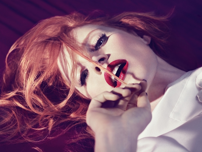 Jessica Chastain with red hair and red lipstick