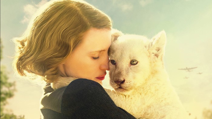 Jessica Chastain with a white lion cub