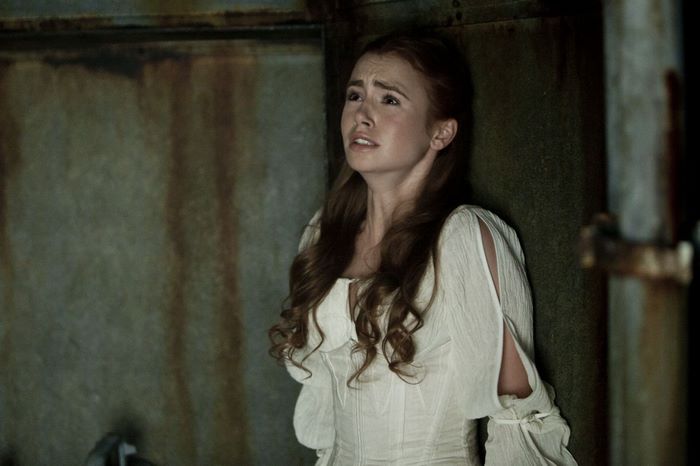 Lily Collins in a white dress