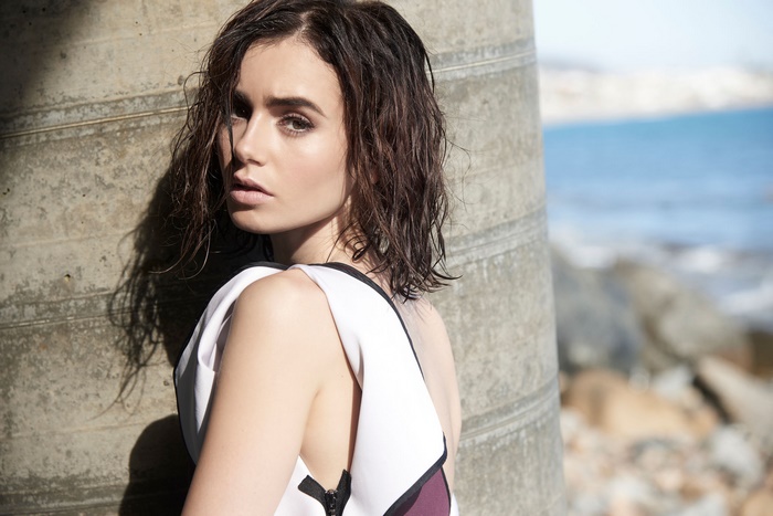 Lily Collins by the ocean